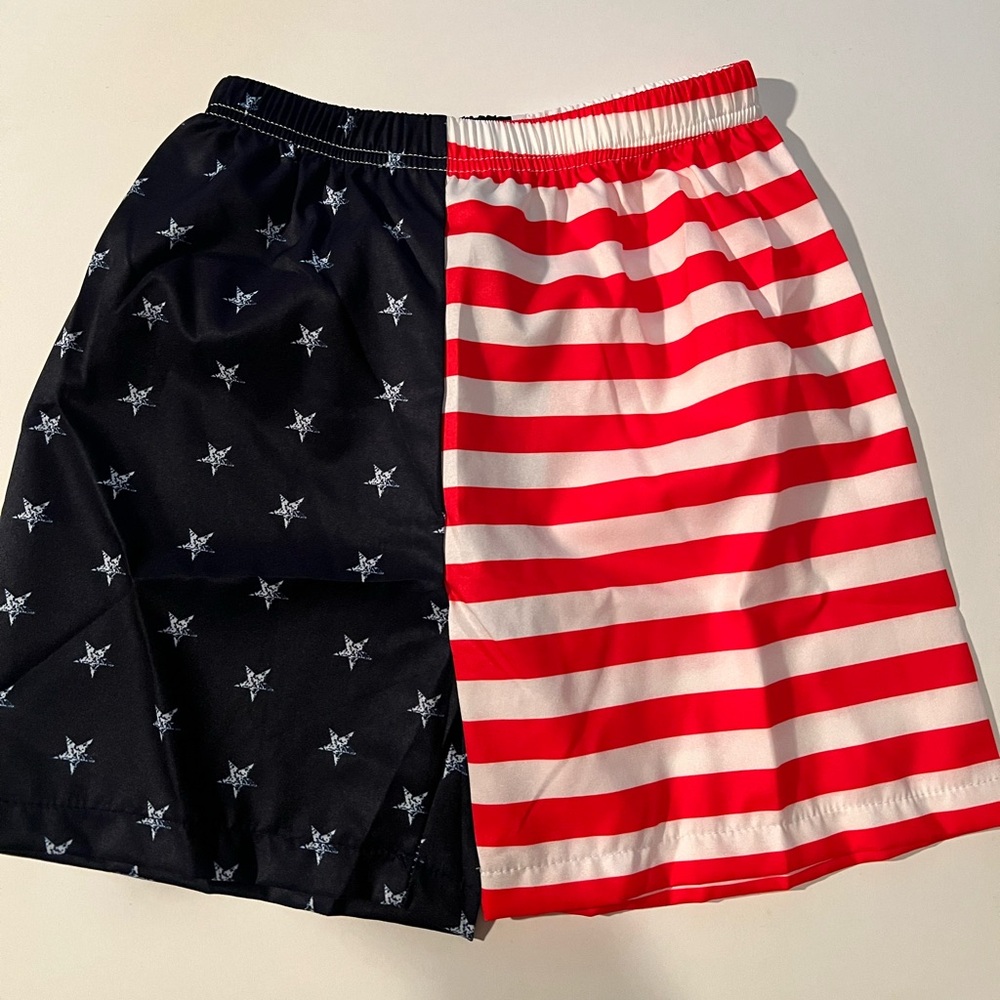 Boys swim trunks. USA print. Ages 5-6.